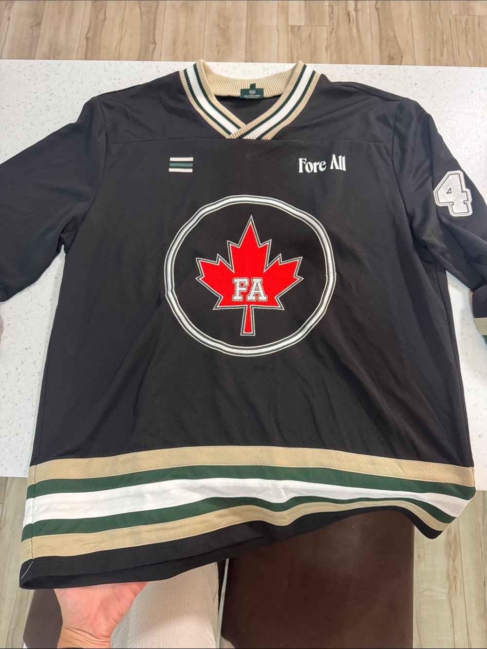 Fore All Men’s Black Hockey Jersey with Red Maple Leaf Logo